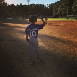 Full length of boy standing in park