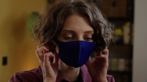 Close-up of woman wearing mask