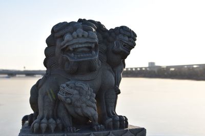 Close-up of statue against clear sky