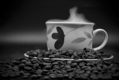 Close-up of coffee cup on table