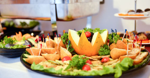 Close-up of fruits in plate on table