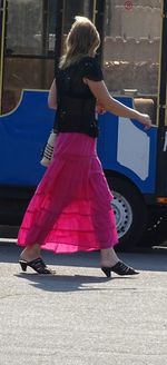 Woman standing on street