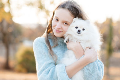 Portrait of woman with dog