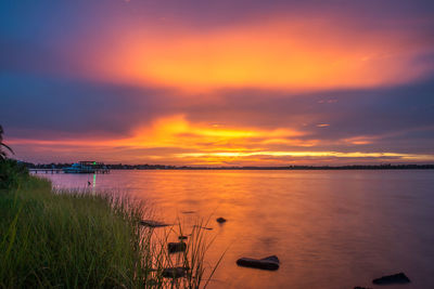 Scenic view of sea at sunset