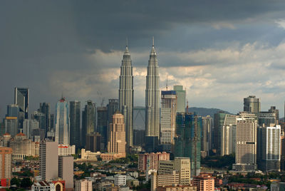 Modern buildings in city against sky