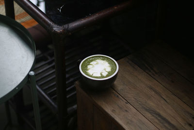 High angle view of metallic container on table