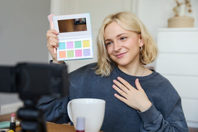 Young woman using mobile phone