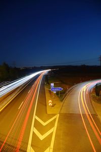 Light trails on road at night