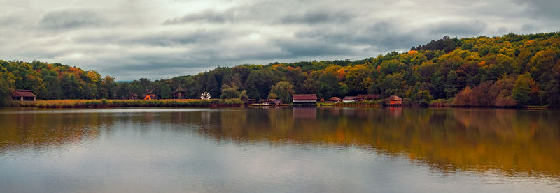  panorama with windmills. dumbrava lake, astra museum of traditional folk civilization sibiu romania