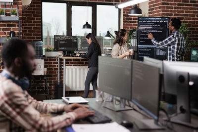 Business colleagues working at office