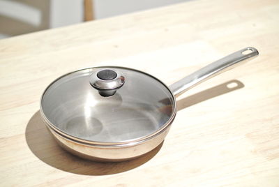 High angle view of cooking pan on table