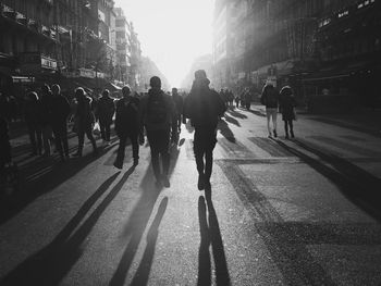 People walking on street in city