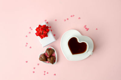 High angle view of food on pink background