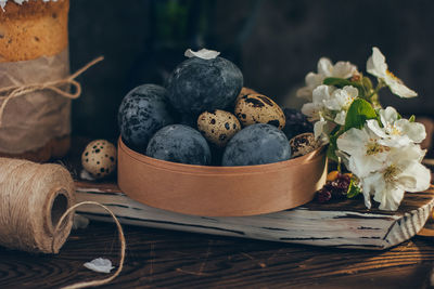 Close-up of fruits in basket on table