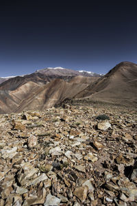 Scenic view of mountains against clear sky