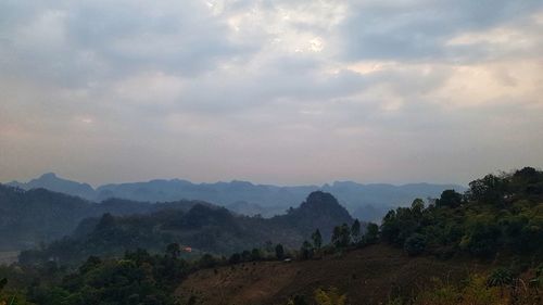 Scenic view of landscape against sky during sunset