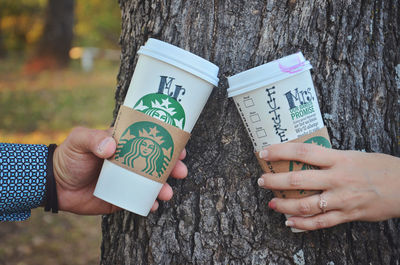 Close-up of hand holding text