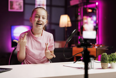 Portrait of young businesswoman working at desk