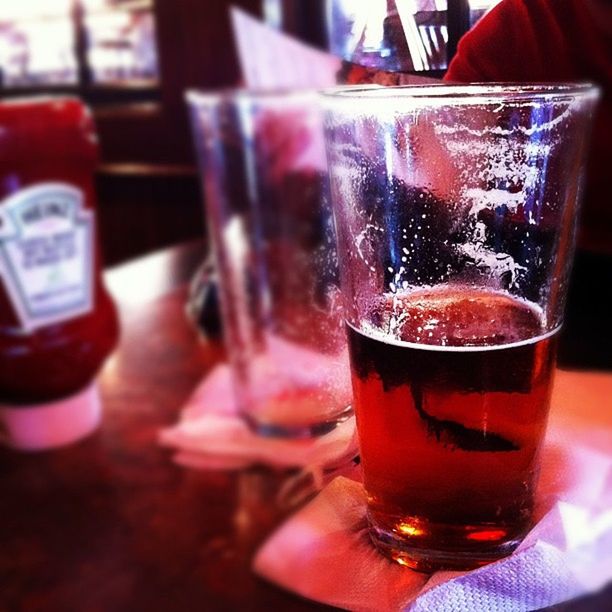 drink, refreshment, food and drink, drinking glass, alcohol, close-up, indoors, freshness, glass - material, table, focus on foreground, cocktail, still life, transparent, beer glass, glass, beer - alcohol, drinking straw, red, cold temperature