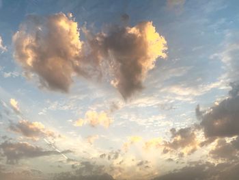 Low angle view of clouds in sky during sunset