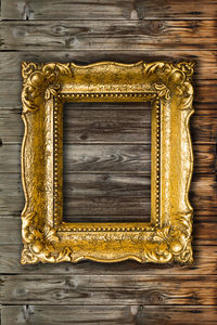 Close-up of carvings on wooden wall