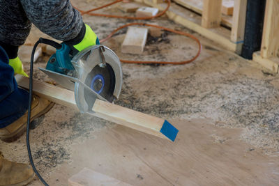 Man working on wood at home