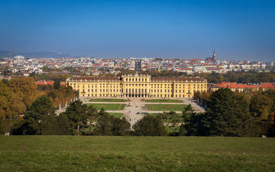 Palace schönbrunn with vienna on the background