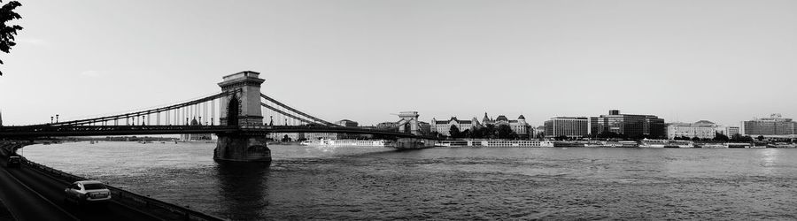 Bridge over river against clear sky