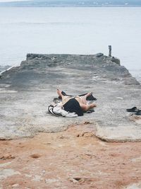 Man lying down on beach