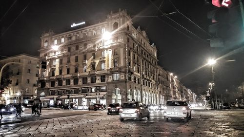 Traffic on road in city at night