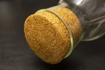 Close up glass bottle for drinks and cork cover