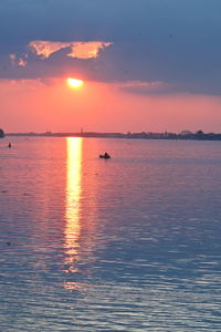 Scenic view of danube against sky during sunset