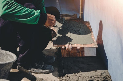 Low section of man working on stage