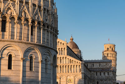 Low angle view of building against blue sky