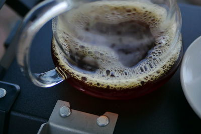 High angle view of coffee cup on table