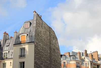 Low angle view of houses against sky