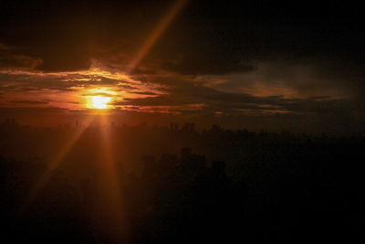 Scenic view of silhouette landscape against sky during sunset