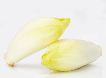 Close-up of bananas against white background