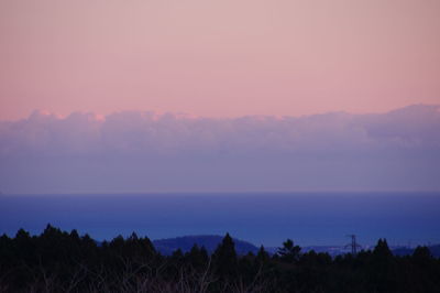 Scenic view of silhouette trees against sky during sunset