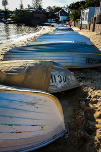 Boats moored at beach