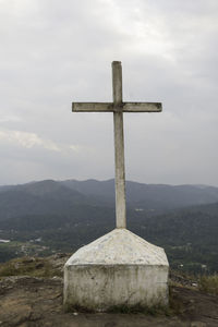 Cross against sky