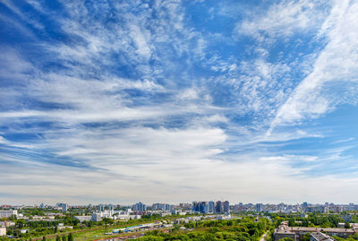 Panoramic modern city skyline , daytime view with city skyscrapers under beautiful blue sky in kyiv.