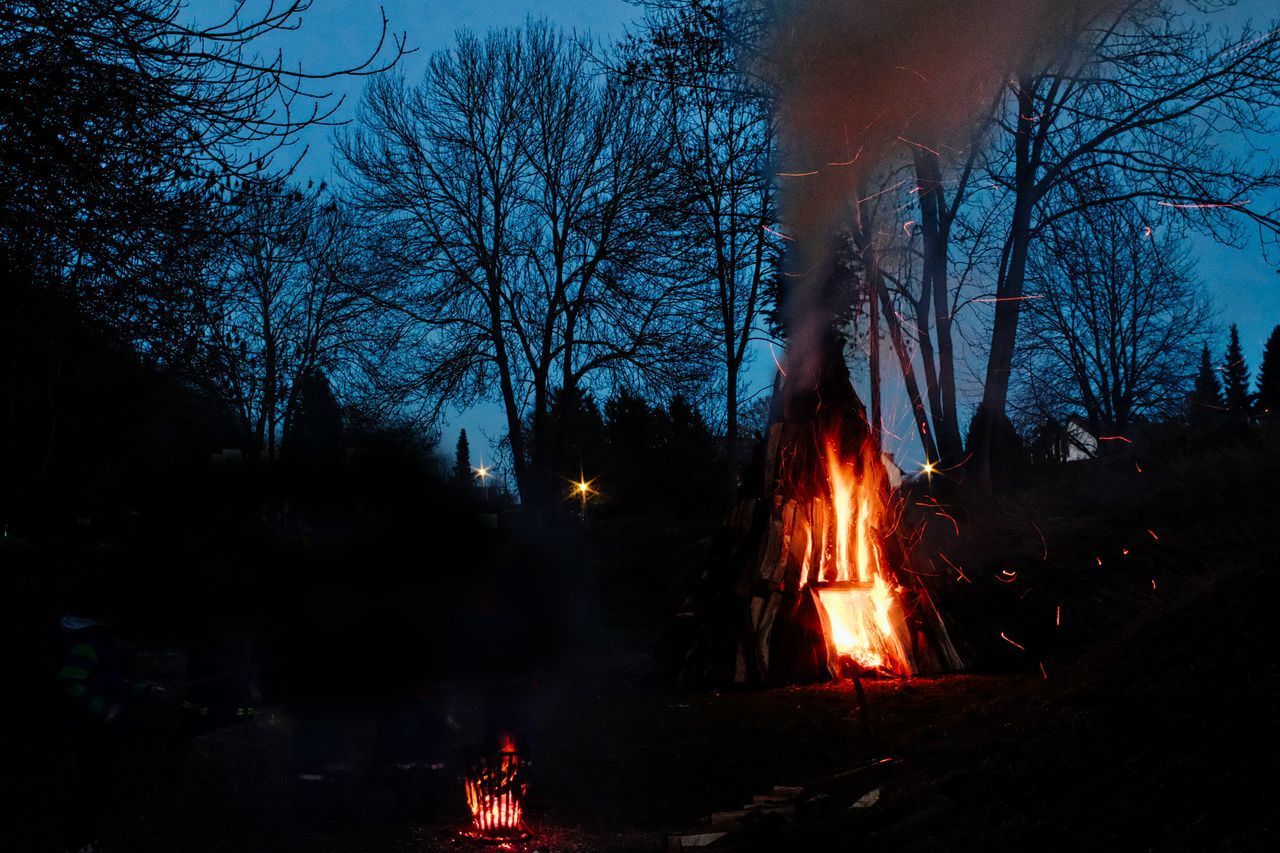 VIEW OF BONFIRE AGAINST SKY AT NIGHT