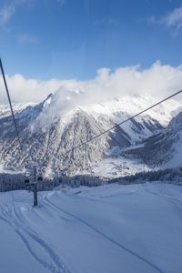 Snow covered mountain against sky