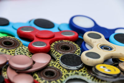 Close-up of fidget spinners on white background