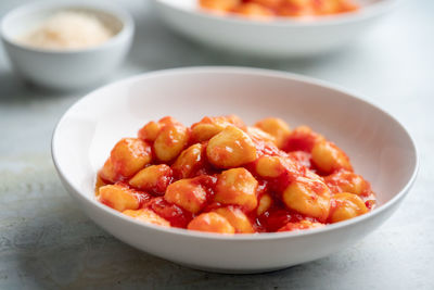 Close-up of strawberries in bowl on table