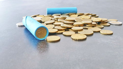 High angle view of coins on table