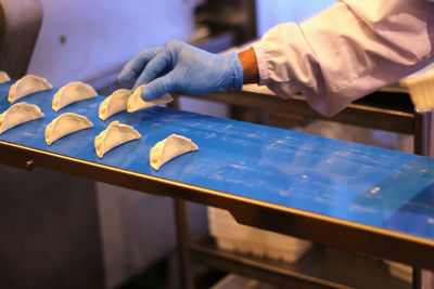 Close-up of person preparing food