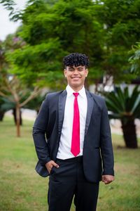 Young man standing on field