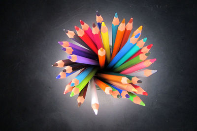 High angle view of multi colored pencils on table